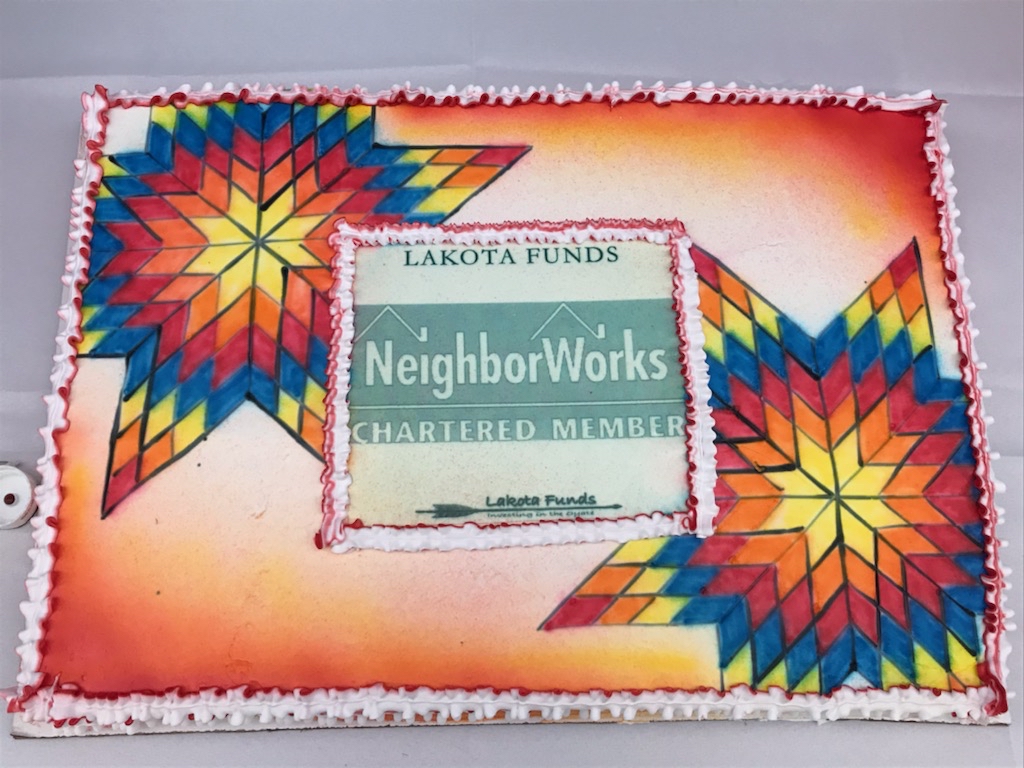 Celebration cake for new chartered member Lakota Funds.